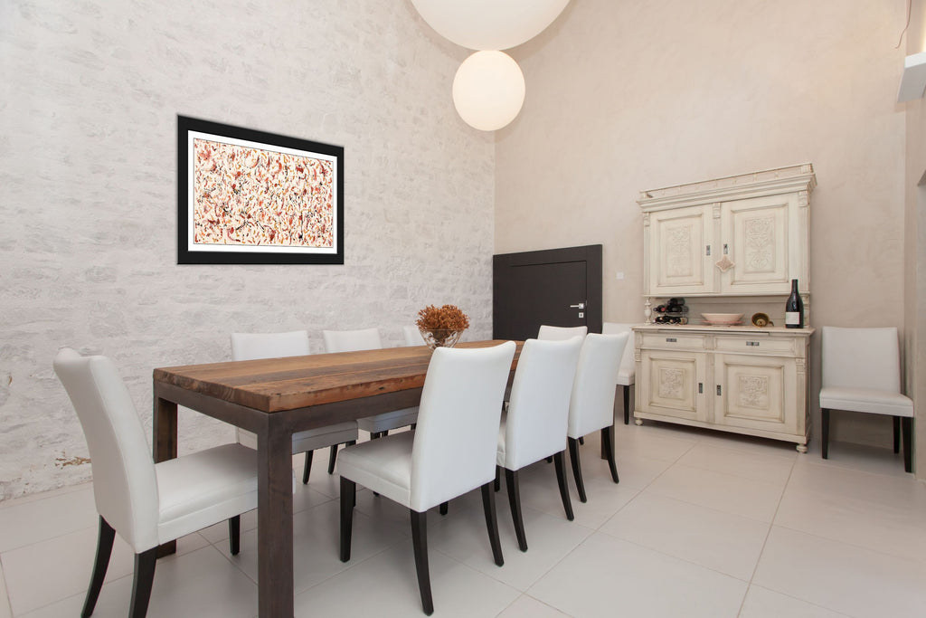 Scattered Mind — original abstract painting by Gallery 68 displayed in a contemporary dining room, framed in black, showing warm cream, orange and earthy tones with dark flecks