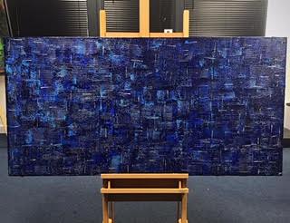 Denim original abstract painting by Alli Cullimore on an easel — 152.5×76cm acrylic on canvas with richly textured lines and squares in deep navy, cobalt and midnight blue